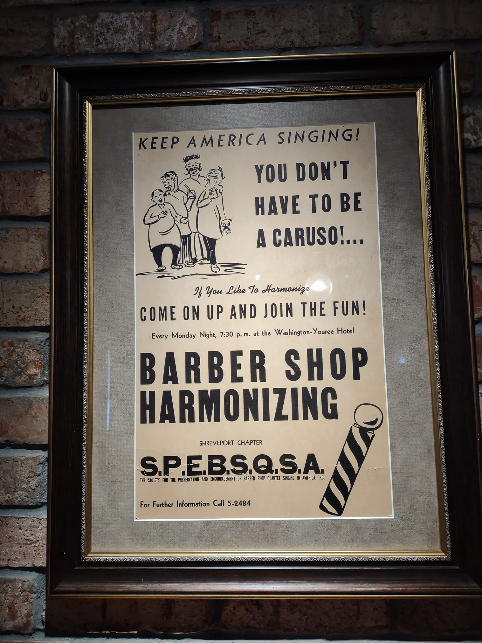 Text on old poster: ““KEEP AMERICA SINGING! • YOU DON'T HAVE TO BE A CARUSO!… • If You Like To Harmonize • COME ON UP AND JOIN THE FUN! • Every Monday Night, 7:30 ㏘ at the Washington-Youree Hotel • BARBER SHOP HARMONIZING • Shreveport Chapter • S.P.E.B.S.Q.S.A. • The Society for the Preservation and Encouragement of Barber Shop Quartet Singng in America, Inc. • For Further Information Call 5-2484”